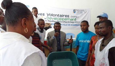 United Nations Volunteers provide a batch of sanitation tools to Congolese Youth Volunteers Corps